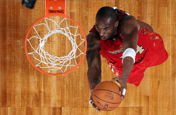 West All Star Bryant of the Lakers dunks during the NBA All-Star game in Los Angeles