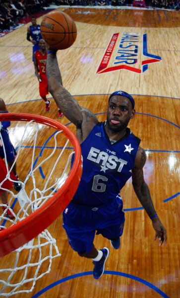 East All Star James of the Heat dunks during the NBA All-Star basketball game in Los Angeles